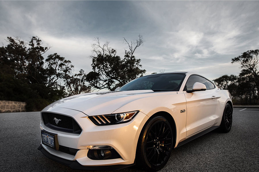 white mustang with car tint and paint protection